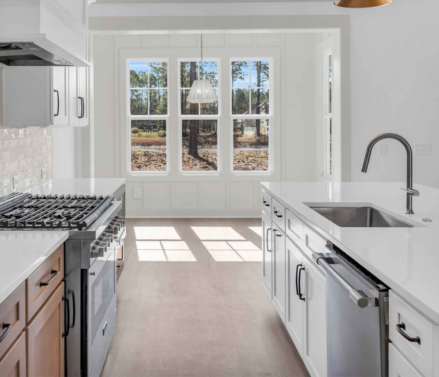 Open kitchen and dining area designed for coastal living in North Carolina